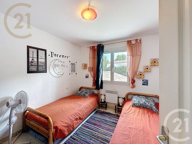 Afficher la photo en grand maison à vendre - 5 pièces - 162.6 m2 - POUSSAN - 34 - LANGUEDOC-ROUSSILLON - Century 21 Agence De La Gardiole