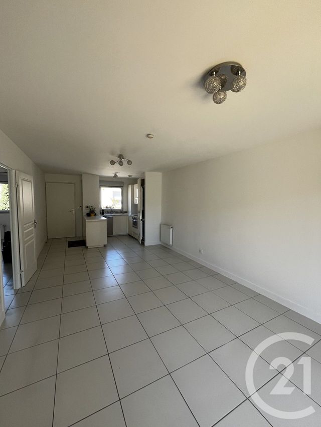 Appartement F3 à louer - 3 pièces - 61.72 m2 - POUSSAN - 34 - LANGUEDOC-ROUSSILLON - Century 21 Agence De La Gardiole