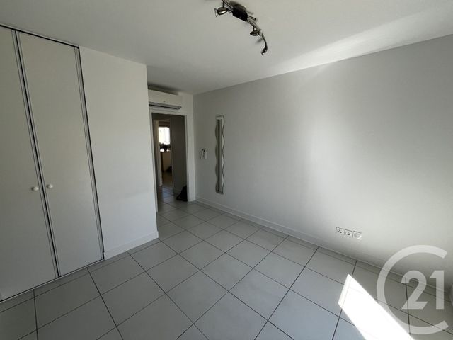 Appartement F3 à louer - 3 pièces - 61.72 m2 - POUSSAN - 34 - LANGUEDOC-ROUSSILLON - Century 21 Agence De La Gardiole