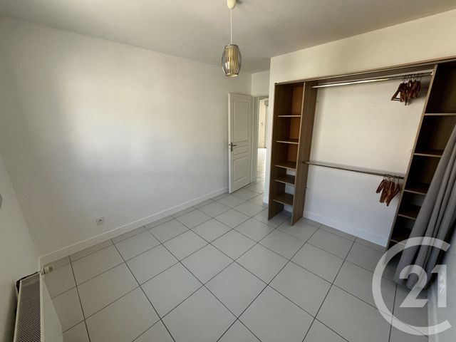 Appartement F3 à louer - 3 pièces - 61.72 m2 - POUSSAN - 34 - LANGUEDOC-ROUSSILLON - Century 21 Agence De La Gardiole