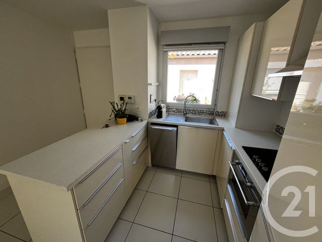 Appartement F3 à louer - 3 pièces - 61.72 m2 - POUSSAN - 34 - LANGUEDOC-ROUSSILLON - Century 21 Agence De La Gardiole